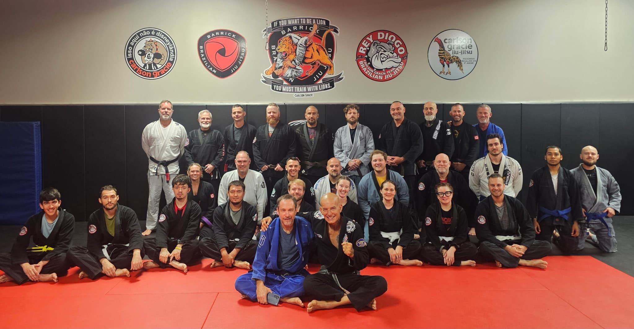 Barrick BJJ coaches and students together on the mats in Goshen, Indiana
